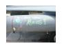 Chalk graffiti on drop tanks: 'Black Widow Rules!